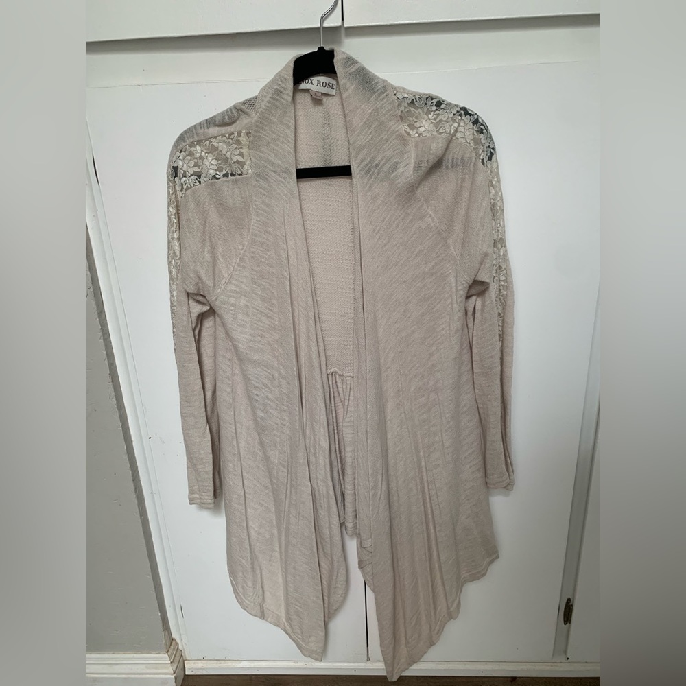 Cream color cover up with lace lined sleeves